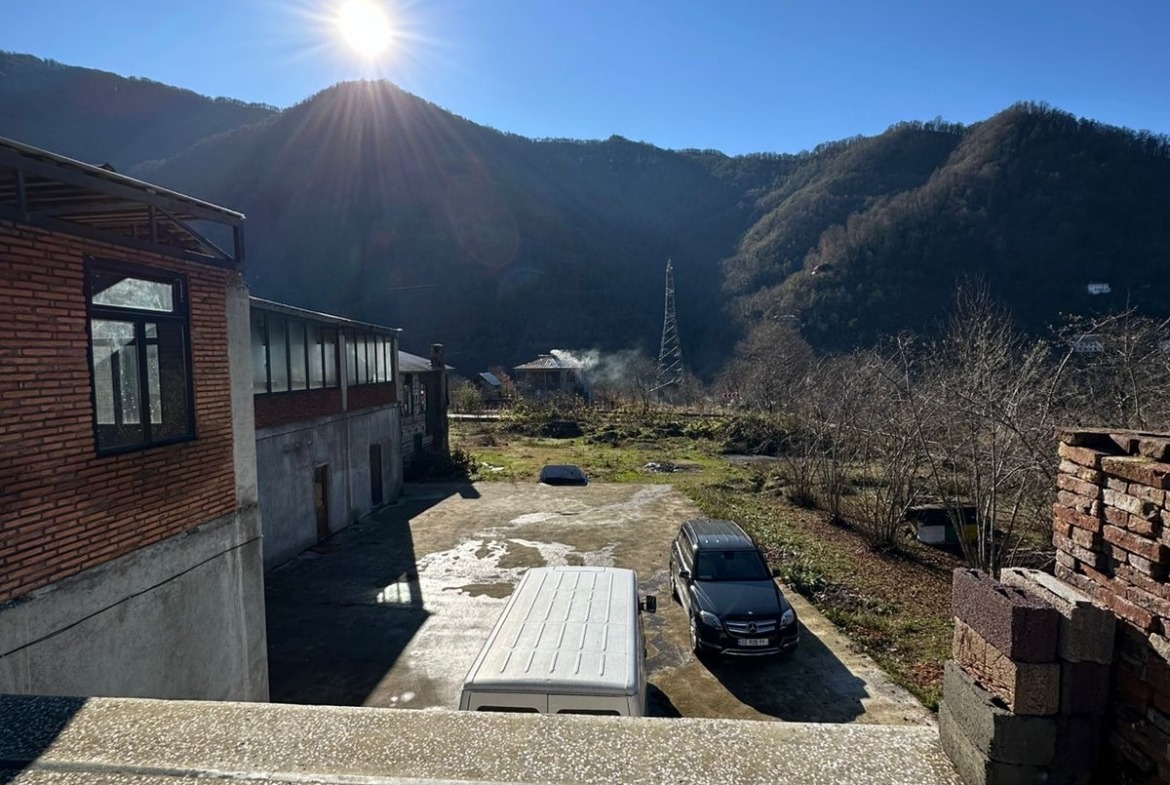 Commercial building with plot of land for sale