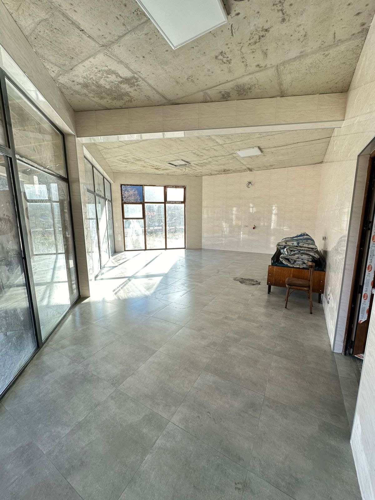 Commercial building with plot of land for sale