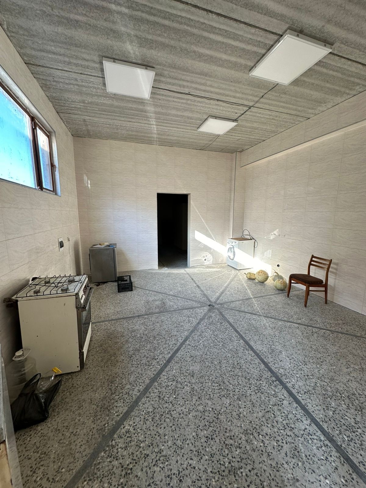 Commercial building with plot of land for sale