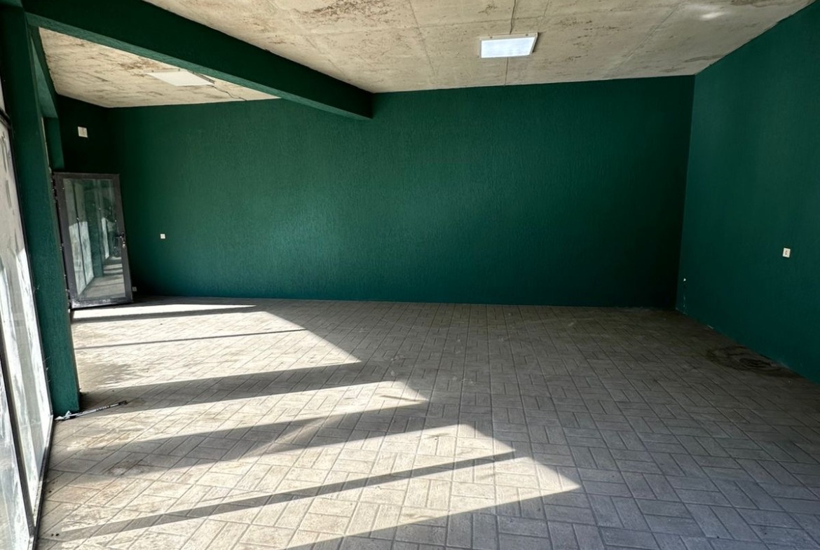 Commercial building with plot of land for sale