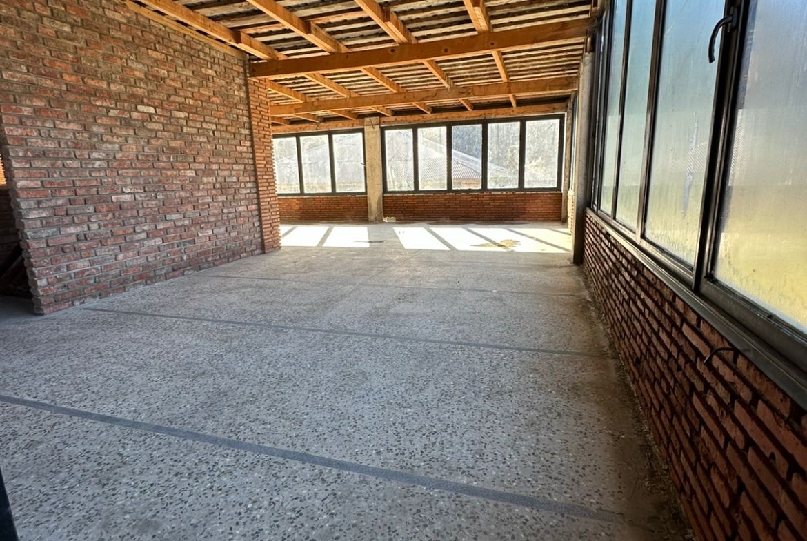 Commercial building with plot of land for sale